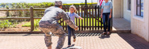 daughter running to greet her father as he returns from combat