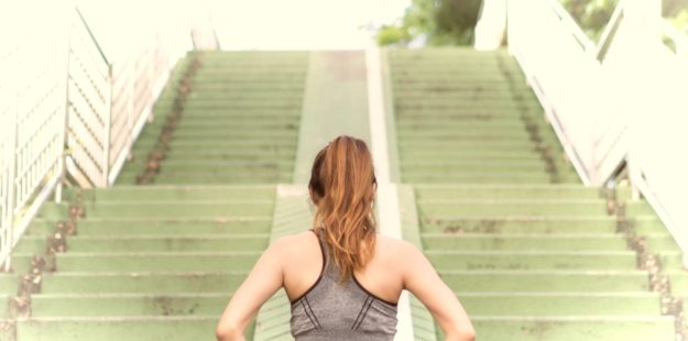 Woman climbing stairs