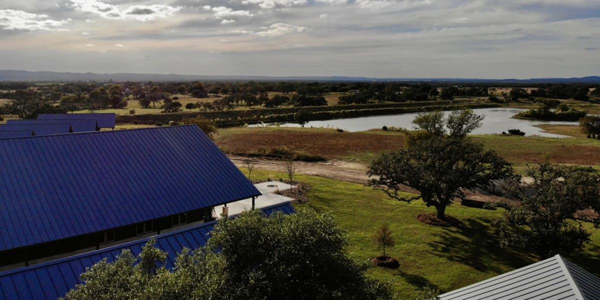 warriors heart texas lakeside location exterior buildings with lake aerial 01