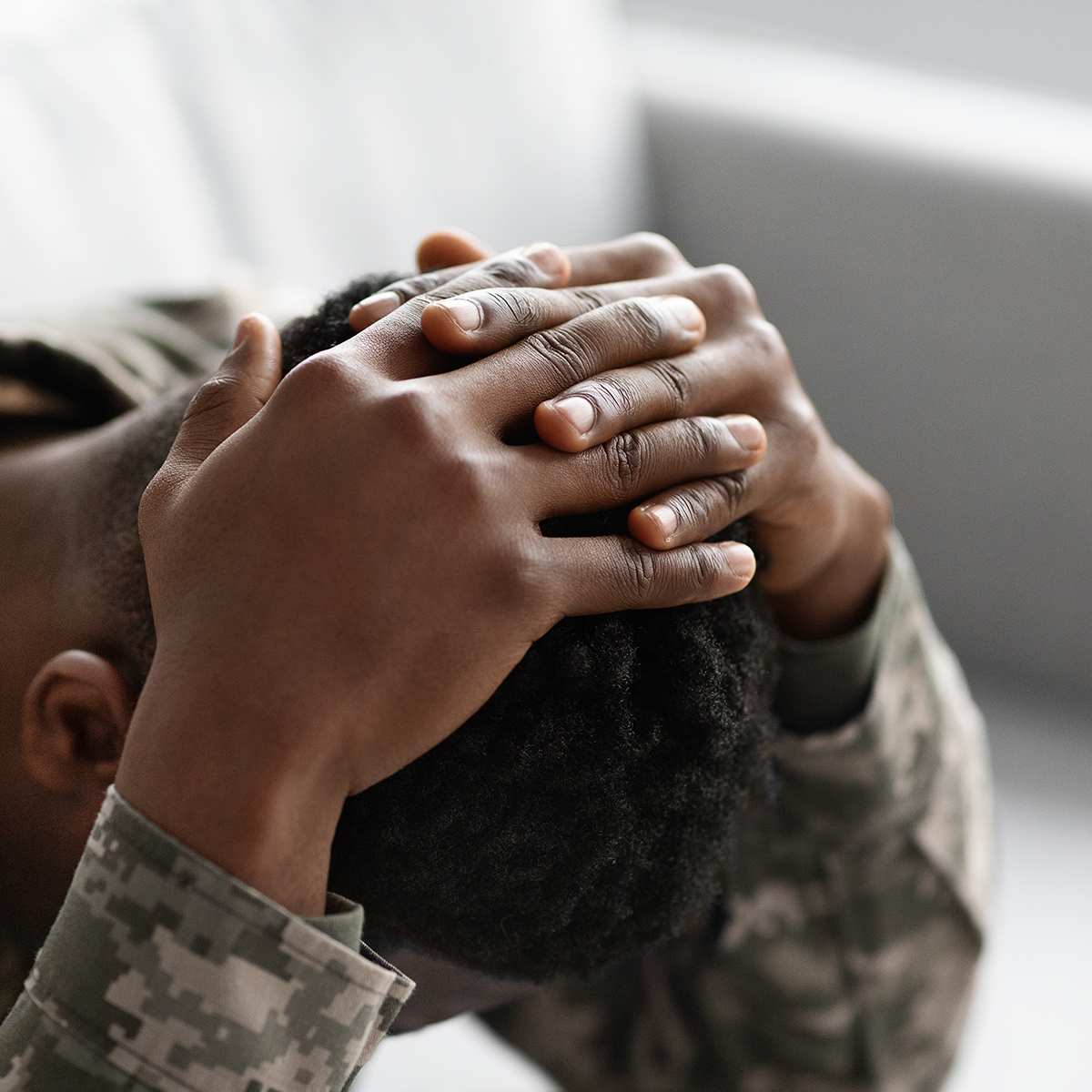 stressed warrior hands on floor hands on head
