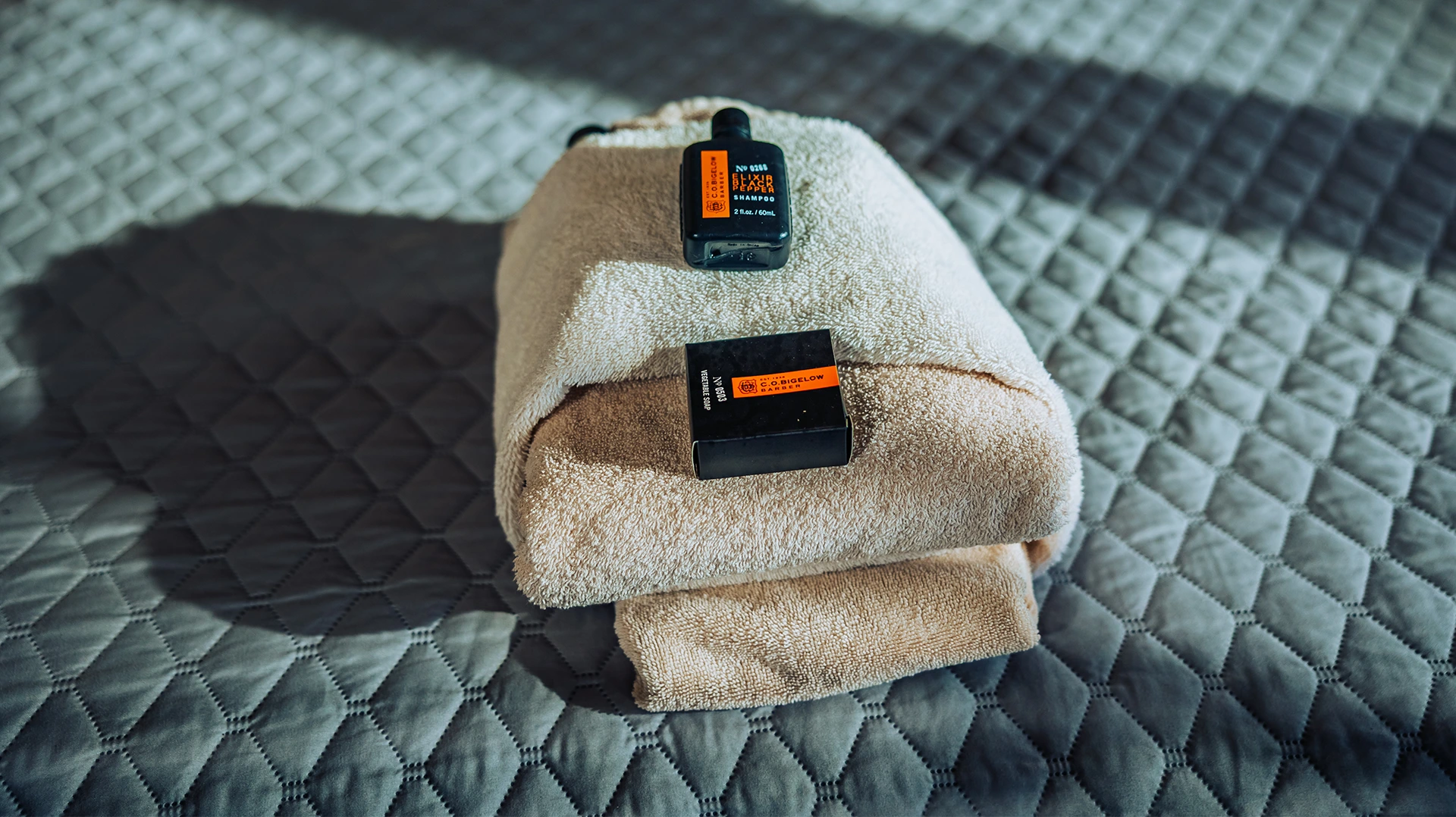 toiletries and towels on warriors bed