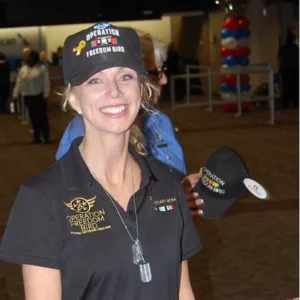 annette hill wearing operation freedom bird gear and dogtags