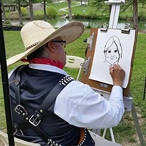 Dan Monreal drawing charicatures